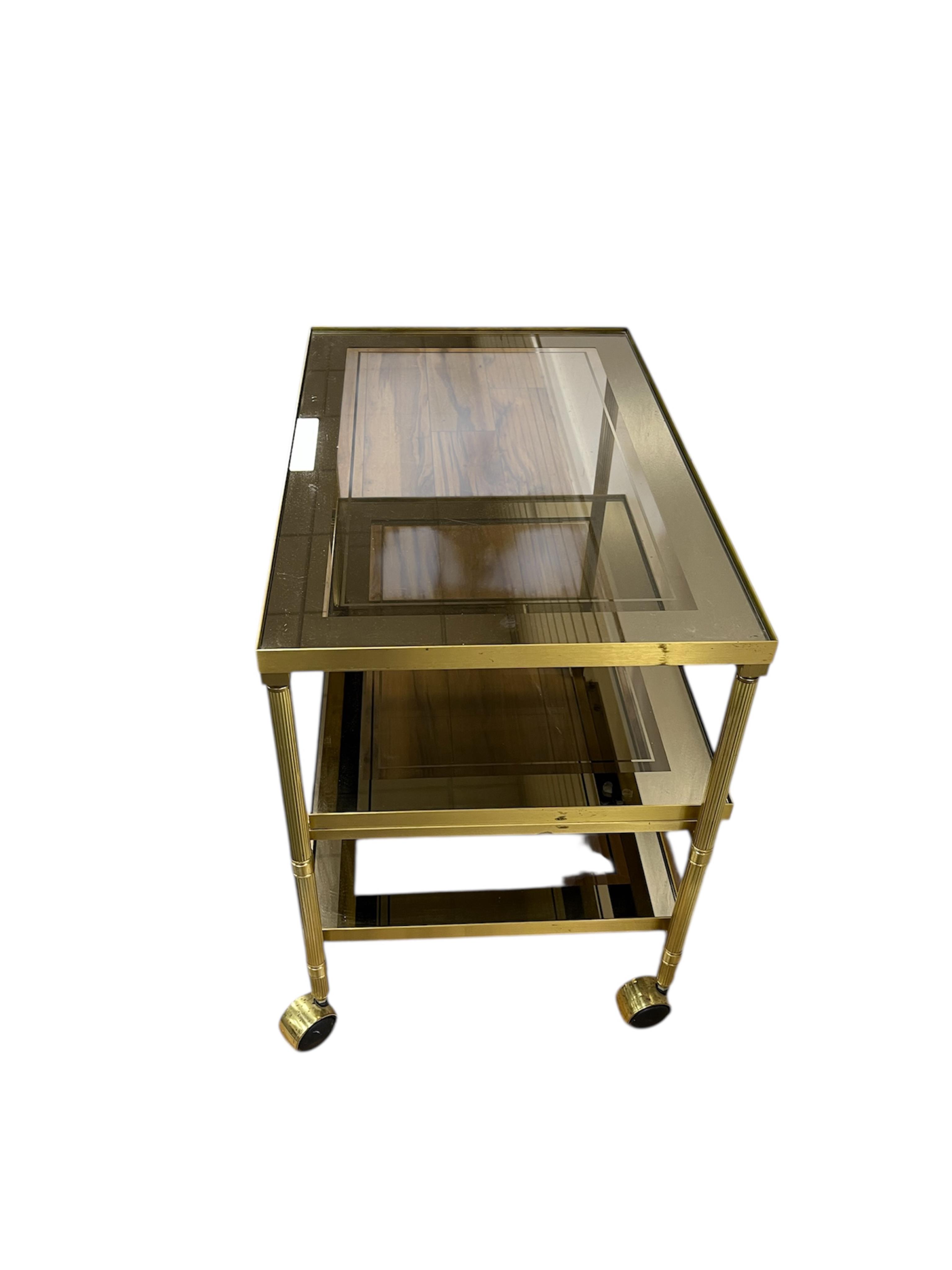 A brass three tier tea trolley, width 67cm, depth 44cm, height 60cm